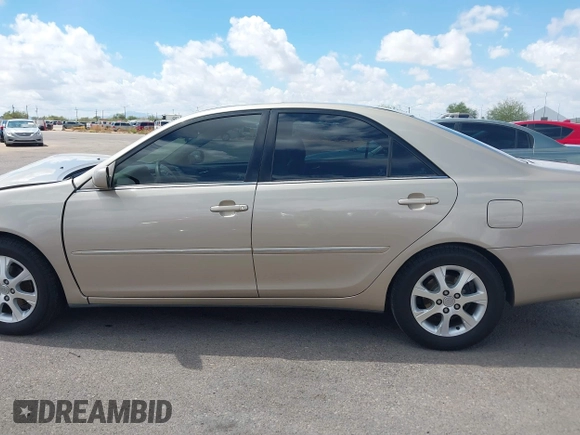 2006 Toyota Camry STD z VIN 4T1BE30KX6U658158, wystawiony jako IAAI lot #42394262 z przebiegiem 102 830 mil mil oraz . Historia ofert i sprzedaży dostępna na DreamBid. Obrazek 14.