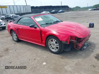2003 Ford Mustang Deluxe with VIN 1FAFP44433F452977, listed as a IAAI auction lot 42598309 with 99,596 mi miles and . Bid and sale history available at DreamBid. Image 1.