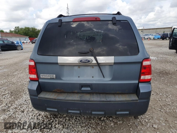 2011 Ford Escape Limited z VIN 1FMCU0E77BKC61667, wystawiony jako Copart lot #56493325 z przebiegiem 170 386 mil mil oraz Szkoda całkowita • Salvage title. Historia ofert i sprzedaży dostępna na DreamBid. Obrazek 6.