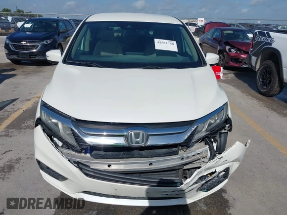 2018 Honda Odyssey EX with VIN 5FNRL6H57JB100035, listed as a IAAI auction lot 42582758 with 88,585 mi miles and . Bid and sale history available at DreamBid. Image 13.