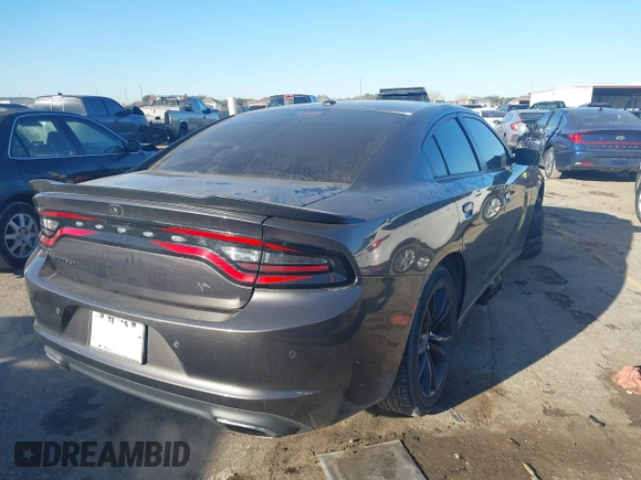 2018 Dodge Charger SXT with VIN 2C3CDXBG6JH126031, listed as a IAAI auction lot 41400041 with 127,906 mi miles and . Bid and sale history available at DreamBid. Image 4.