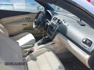 2012 Volkswagen Eos Komfort with VIN WVWBW7AH8CV001621, listed as a IAAI auction lot 41988717 with 146,882 mi miles and . Bid and sale history available at DreamBid. Image 5.
