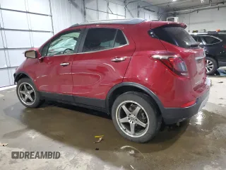 2017 Buick Encore Essence with VIN KL4CJGSBXHB216997, listed as a Copart auction lot 87928365 with 41,852 mi miles and Salvage Title. Bid and sale history available at DreamBid. Image 2.