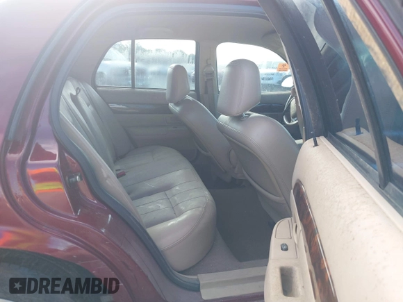 2004 Mercury Grand Marquis LS Premium z VIN 2MEFM75WX4X671041, wystawiony jako IAAI lot #42261517 z przebiegiem 107 182 mil mil oraz . Historia ofert i sprzedaży dostępna na DreamBid. Obrazek 8.