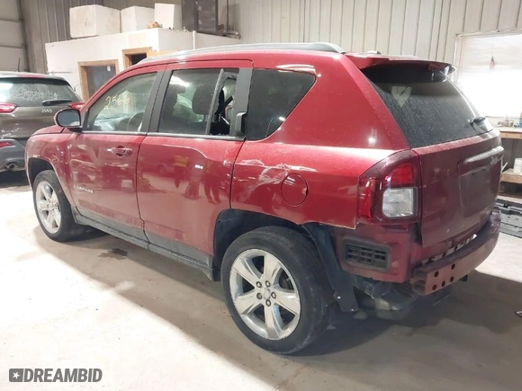 2014 Jeep Compass Latitude with VIN 1C4NJCEB9ED717575, listed as a IAAI auction lot 41532566 with 128,821 mi miles. Bid and sale history available at carsss.com. Image 3.