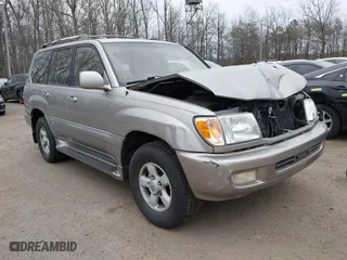 2001 Toyota Land Cruiser with VIN JTEHT05J112010131, listed as a IAAI auction lot 41719396 with 265,944 mi miles. Bid and sale history available at carsss.com. Image 1.