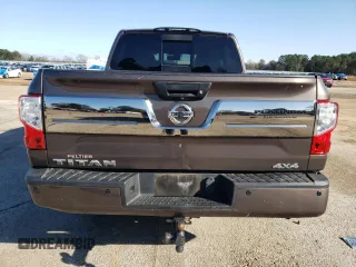 2017 Nissan Titan SL z VIN 1N6AA1E54HN512447, wystawiony jako Copart lot #85330734 z przebiegiem 119 424 mil mil oraz Czysty tytuł • Clean title. Historia ofert i sprzedaży dostępna na DreamBid. Obrazek 6.
