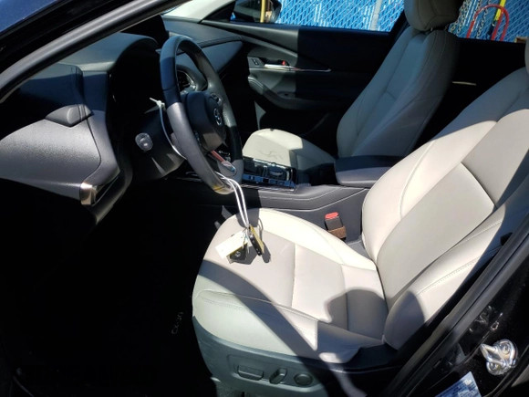 2023 Mazda CX-30 S Carbon Edition with VIN 3MVDMBCM8PM517987, listed as a Copart auction lot 43248925 with 10,009 mi miles and Non Repairable. Bid and sale history available at carsss.com. Image 7.