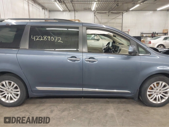 2016 Toyota Sienna XLE with VIN 5TDYK3DC3GS747411, listed as a IAAI auction lot 42289072 with 184,546 mi miles and . Bid and sale history available at DreamBid. Image 14.