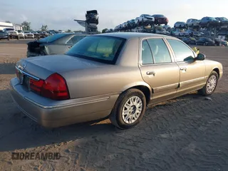 2004 Mercury Grand Marquis GS with VIN 2MEFM74WX4X696703, listed as a IAAI auction lot 42171970 with 149,556 mi miles and . Bid and sale history available at DreamBid. Image 4.