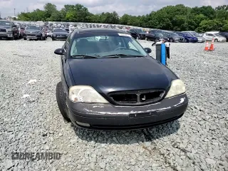 2002 Mercury Sable LS Premium with VIN 1MEHM55S02A621328, listed as a Copart auction lot 59556805 with 183,594 mi miles and Salvage title. Bid and sale history available at DreamBid. Image 13.