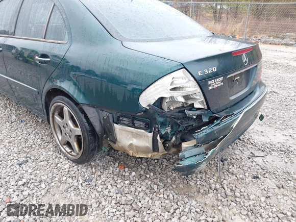 2003 Mercedes-Benz E-Class 3.2L with VIN WDBUF65J73A130214, listed as a IAAI auction lot 41731642 with 203,520 mi miles. Bid and sale history available at carsss.com. Image 6.