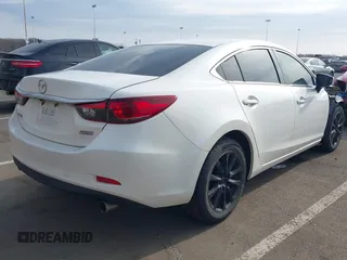 2014 Mazda 6 i Sport with VIN JM1GJ1U67E1159003, listed as a IAAI auction lot 41710750 with 200,522 mi miles. Bid and sale history available at carsss.com. Image 4.