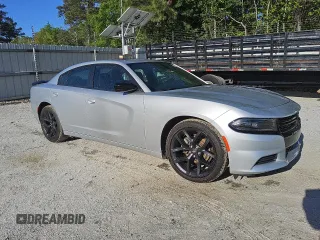 2022 Dodge Charger SXT with VIN 2C3CDXBG7NH119949, listed as a Copart auction lot 51789165 with 50,735 mi miles and Clean Title. Bid and sale history available at DreamBid. Image 4.