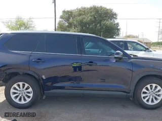 2024 Toyota Grand Highlander XLE with VIN 5TDAAAB59RS059896, listed as a IAAI auction lot 41691709 with 7,294 mi miles. Bid and sale history available at carsss.com. Image 14.
