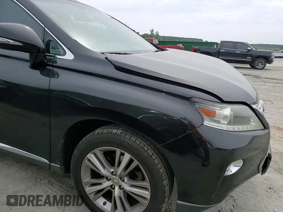 2015 Lexus RX 350 z VIN 2T2BK1BAXFC309922, wystawiony jako Copart lot #57360725 z przebiegiem 189 139 mil mil oraz Szkoda całkowita • Salvage title. Historia ofert i sprzedaży dostępna na DreamBid. Obrazek 14.