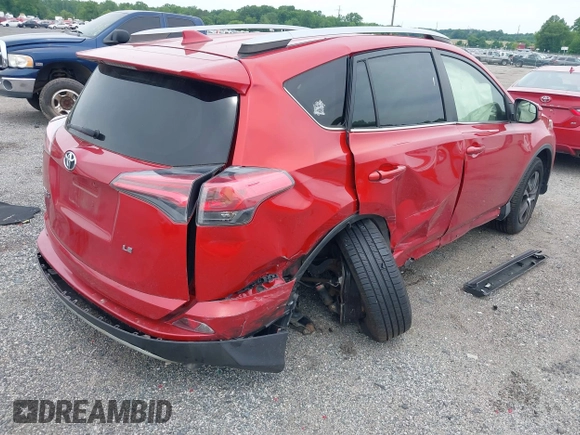 2017 Toyota RAV4 LE with VIN JTMBFREV8HJ161427, listed as a IAAI auction lot 42333851 with 121,161 mi miles and . Bid and sale history available at DreamBid. Image 4.