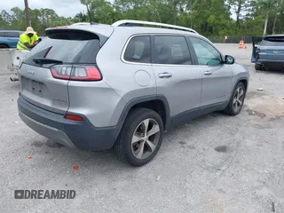 2020 Jeep Cherokee Limited with VIN 1C4PJLDB2LD560723, listed as a IAAI auction lot 41658092 with 73,978 mi miles. Bid and sale history available at carsss.com. Image 4.