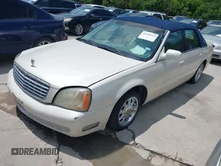 2002 Cadillac DeVille z VIN 1G6KD54Y42U206950, wystawiony jako IAAI lot #42189419 z przebiegiem 98 150 mil mil oraz . Historia ofert i sprzedaży dostępna na DreamBid. Obrazek 2.