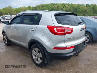 2011 Kia Sportage LX with VIN KNDPB3A23B7053943, listed as a IAAI auction lot 42063941 with 234,364 mi miles and . Bid and sale history available at carsss.com. Image 3.