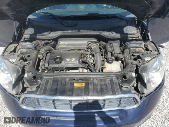 2013 MINI Countryman S ALL4 with VIN WMWZC5C50DWM15256, listed as a Copart auction lot 58080895 with 123,514 mi miles and Salvage title. Bid and sale history available at DreamBid. Image 11.