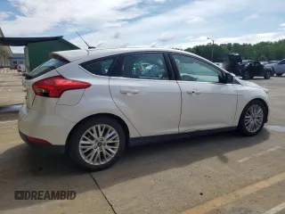 2017 Ford Focus Titanium with VIN 1FADP3N24HL206365, listed as a Copart auction lot 63199965 with 51,435 mi miles and Salvage title. Bid and sale history available at DreamBid. Image 3.