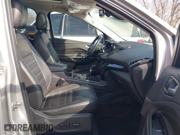 2017 Ford Escape Titanium with VIN 1FMCU0JD3HUB13234, listed as a IAAI auction lot 41760944 with 113,361 mi miles. Bid and sale history available at carsss.com. Image 5.