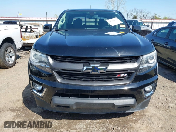 2018 Chevrolet Colorado 4WD Z71 z VIN 1GCGTDEN0J1173420, wystawiony jako IAAI lot #41971813 z przebiegiem 98 499 mil mil oraz . Historia ofert i sprzedaży dostępna na DreamBid. Obrazek 12.