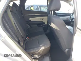 2023 Hyundai Tucson SEL z VIN KM8JBCAE2PU248128, wystawiony jako IAAI lot #41771316 z przebiegiem 52 224 mil mil oraz . Historia ofert i sprzedaży dostępna na DreamBid. Obrazek 8.