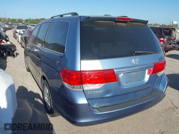 2009 Honda Odyssey EX-L with VIN 5FNRL38759B001130, listed as a IAAI auction lot 42004710 with 142,126 mi miles and . Bid and sale history available at DreamBid. Image 3.