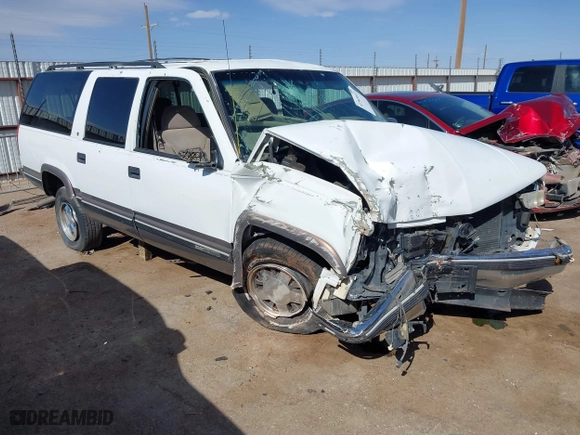 1998 GMC Suburban with VIN 1GKEC16RXWJ731468, listed as a IAAI auction lot 41945613 with 236,854 mi miles. Bid and sale history available at carsss.com. Image 1.