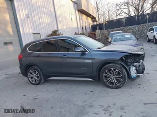 2017 BMW X1 xDrive28i with VIN WBXHT3C33H5F87591, listed as a IAAI auction lot 41256899 with 69,362 mi miles. Bid and sale history available at carsss.com. Image 13.