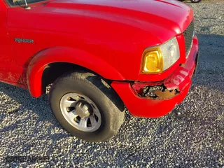 2003 Ford Ranger XL with VIN 1FTYR10U83PB47275, listed as a IAAI auction lot 41826628 with 214,845 mi miles. Bid and sale history available at carsss.com. Image 12.