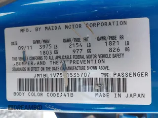 2012 Mazda Mazda3 i Touring with VIN JM1BL1V75C1535707, listed as a IAAI auction lot 41988579 with 168,560 mi miles. Bid and sale history available at carsss.com. Image 9.