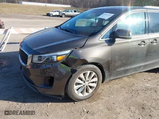 2016 Kia Sedona EX with VIN KNDMC5C14G6108235, listed as a IAAI auction lot 41497169 with 105,218 mi miles. Bid and sale history available at carsss.com. Image 6.
