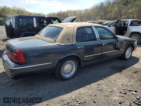 1999 Mercury Grand Marquis LS with VIN 2MEFM75W0XX731008, listed as a Copart auction lot 54375795 with 88,080 mi miles and Salvage Title. Bid and sale history available at DreamBid. Image 3.