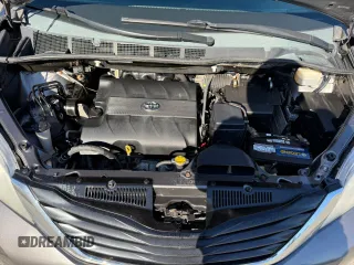 2014 Toyota Sienna LE with VIN 5TDJK3DC4ES074014, listed as a Copart auction lot 48602075 with 284,647 mi miles and Clean Title. Bid and sale history available at DreamBid. Image 7.