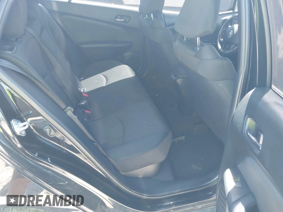 2021 Toyota Prius L Eco with VIN JTDKAMFU6M3141392, listed as a IAAI auction lot 42317866 with 137,495 mi miles and . Bid and sale history available at DreamBid. Image 7.