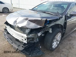 2024 Toyota Camry LE with VIN 4T1R11AK4RU224187, listed as a IAAI auction lot 41574910 with 24,803 mi miles. Bid and sale history available at carsss.com. Image 6.