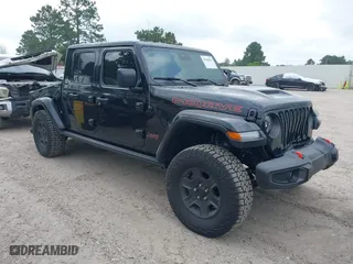 2023 Jeep Gladiator Mojave with VIN 1C6JJTEG0PL573621, listed as a IAAI auction lot 39368563 with 1,950 mi miles. Bid and sale history available at carsss.com. Image 1.