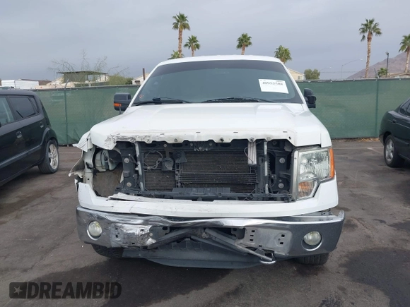 2013 Ford F-150 XL with VIN 1FTFW1ET7DKD70468, listed as a IAAI auction lot 40952588 with 208,052 mi miles. Bid and sale history available at carsss.com. Image 12.