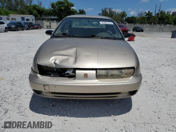 1999 Saturn SL with VIN 1G8ZK5271XZ226783, listed as a Copart auction lot 56467315 with 86,168 mi miles and Salvage title. Bid and sale history available at DreamBid. Image 5.