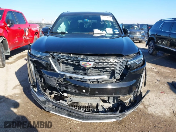 2022 Cadillac XT6 Premium Luxury with VIN 1GYKPCRS1NZ121711, listed as a IAAI auction lot 41149624 with 62,887 mi miles and . Bid and sale history available at DreamBid. Image 12.