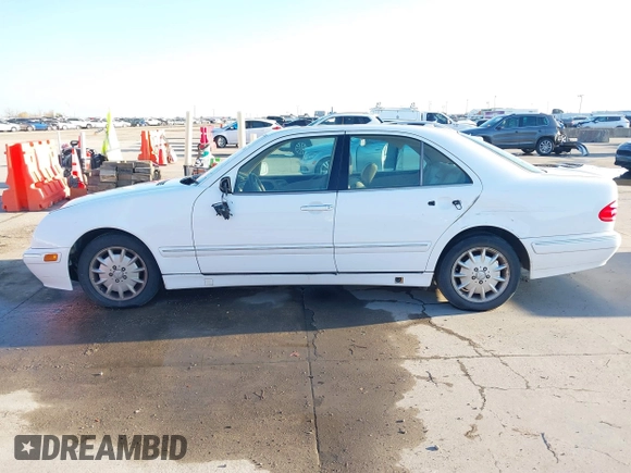 2001 Mercedes-Benz E-Class with VIN WDBJF65J91B249540, listed as a IAAI auction lot 41130248 with 107,582 mi miles. Bid and sale history available at carsss.com. Image 14.