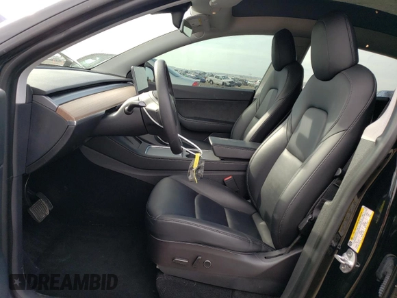 2021 Tesla Model Y Long Range with VIN 5YJYGAEE9MF137910, listed as a Copart auction lot 81921303 with 47,397 mi miles and Salvage Title. Bid and sale history available at DreamBid. Image 7.