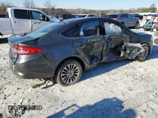 2017 Ford Fusion SE z VIN 3FA6P0H71HR150451, wystawiony jako Copart lot #46283505 z przebiegiem 148 702 mil mil oraz Szkoda całkowita • Salvage title. Historia ofert i sprzedaży dostępna na DreamBid. Obrazek 3.