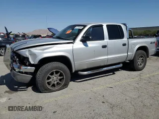 2004 Dodge Dakota SLT z VIN 1D7HG48N74S509797, wystawiony jako Copart lot #57797055 z przebiegiem 214 275 mil mil oraz Szkoda całkowita • Salvage title. Historia ofert i sprzedaży dostępna na DreamBid. Obrazek 1.