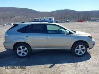 2008 Lexus RX with VIN 2T2HK31U98C071341, listed as a IAAI auction lot 41829229 with 166,031 mi miles. Bid and sale history available at carsss.com. Image 13.