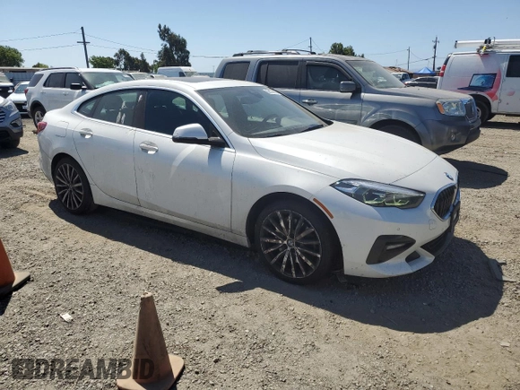 2020 BMW 2 Series 228i xDrive with VIN WBA73AK02L7F72756, listed as a Copart auction lot 59174455 with 60,415 mi miles and Salvage title. Bid and sale history available at DreamBid. Image 4.