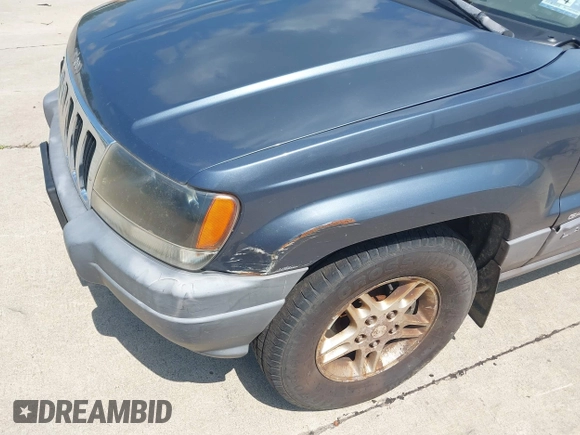 2002 Jeep Grand Cherokee Laredo with VIN 1J4GW48SX2C206755, listed as a IAAI auction lot 42631502 with 155,752 mi miles and . Bid and sale history available at DreamBid. Image 6.